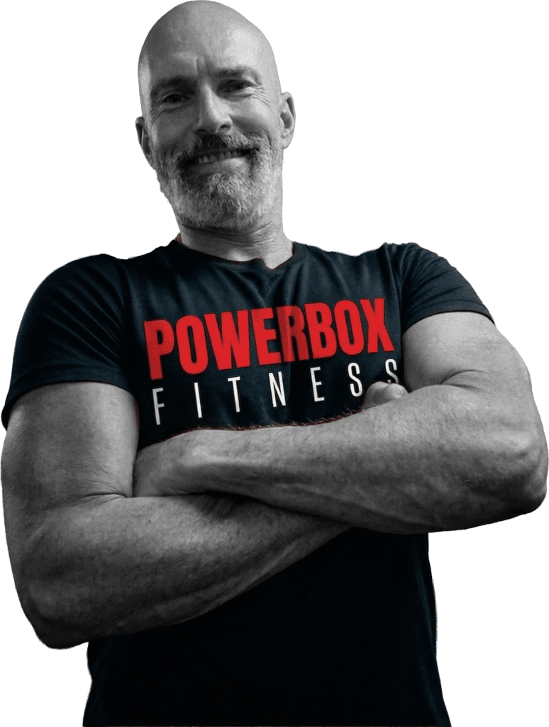 PowerBox Fitness coach smiling with arms crossed