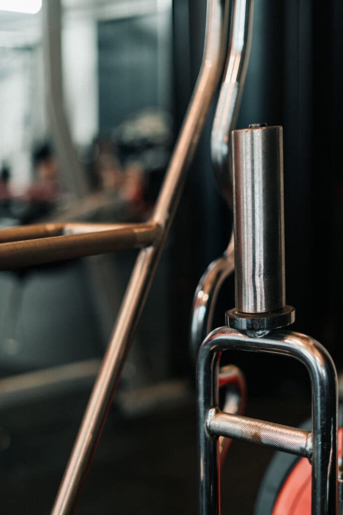 Close-up of chrome gym equipment handles